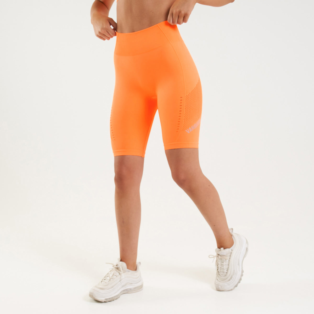 orange cycling shorts