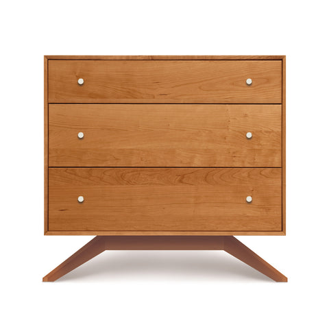 A Copeland Furniture Astrid 3-Drawer Chest with round, white knobs, standing against a white background.