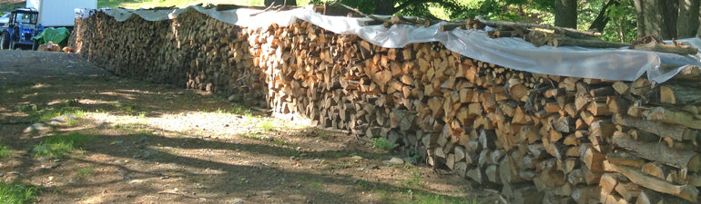 Vermont Woods Studios Furniture Interns: busy stacking 40 cords of firewood