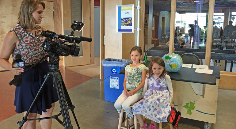 Young monarch fans working the WCAX cameras at the ECHO Center in Burlington, VT.