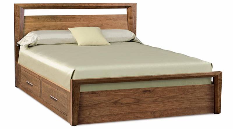 The Mansfeld storage bed, crafted in solid Walnut and made to order.