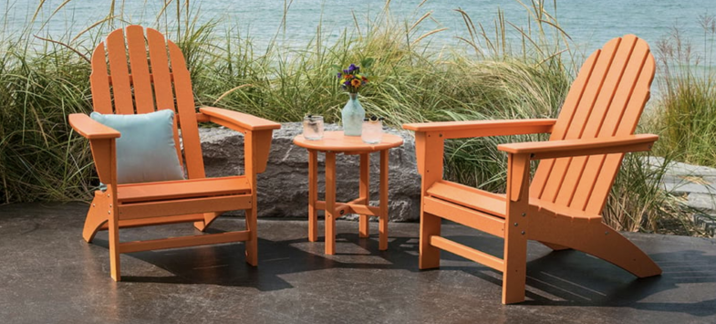 Adirondack chairs in orange & other bright, bold colors. POLYWOOD recycled plastic outdoor furniture.