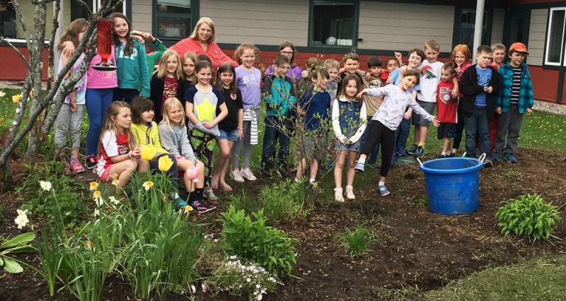 Students Planting Pollinator Garden | Vermont Woods Studios