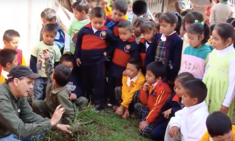 Ed Rashin teaching school children about reforesting their community