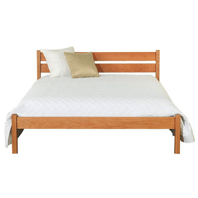 Vergennes platform bed in natural cherry wood. Built by Vermont Furniture Designs