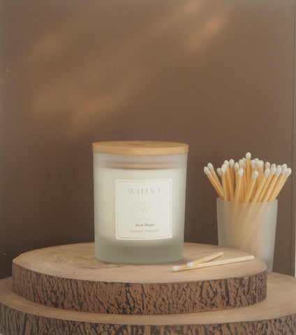 a whist candle - frosted glass and bamboo lid