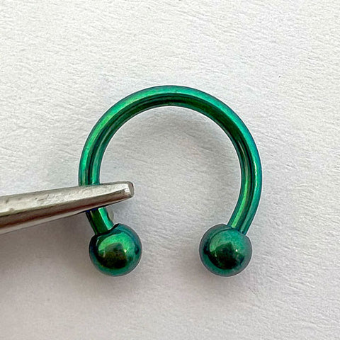 Barbell circular anodizado em verde (Green 105 volts)