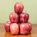 Red Red Delicious Apple stacked on table