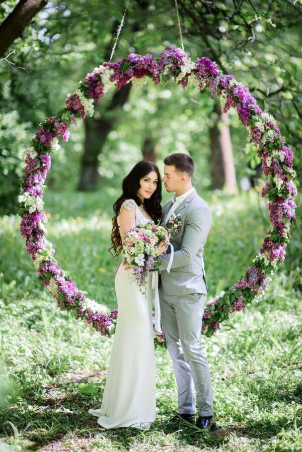 beautiful outdoor wedding with purple and while lilacs