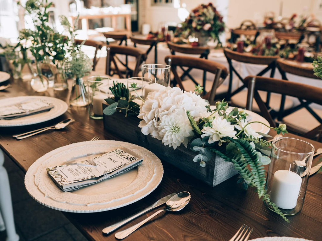 Harvest tables with long floral centerpieces and candles rustic wedding decor ideas