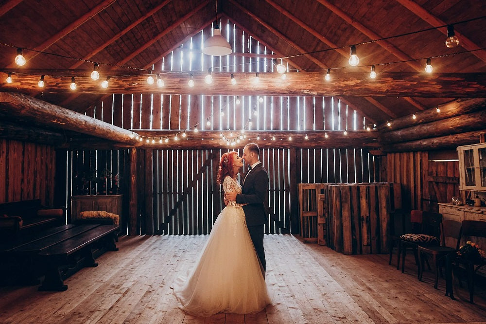 rustic wedding decor barn wedding with string lights over dance floor