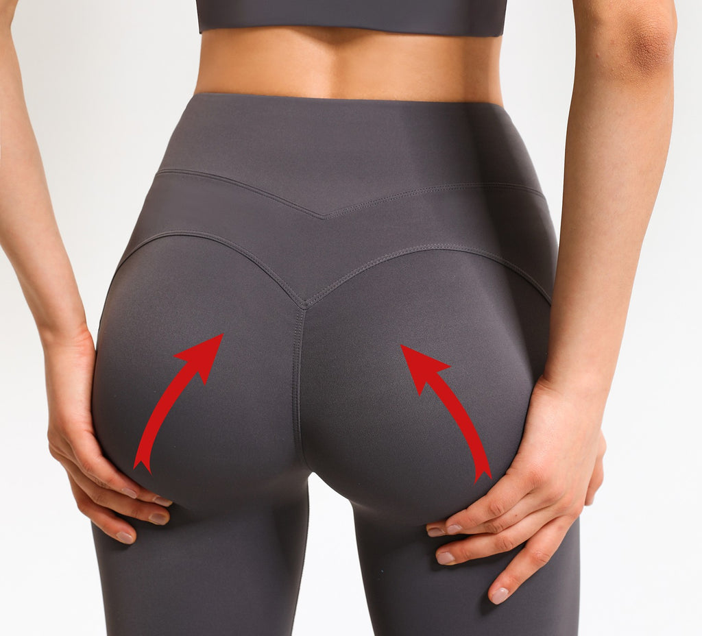 Bumped-That-Your-Yoga-Leggings-Don’t-Fit-Try-This-Trick-pulling towards the middle of the pants