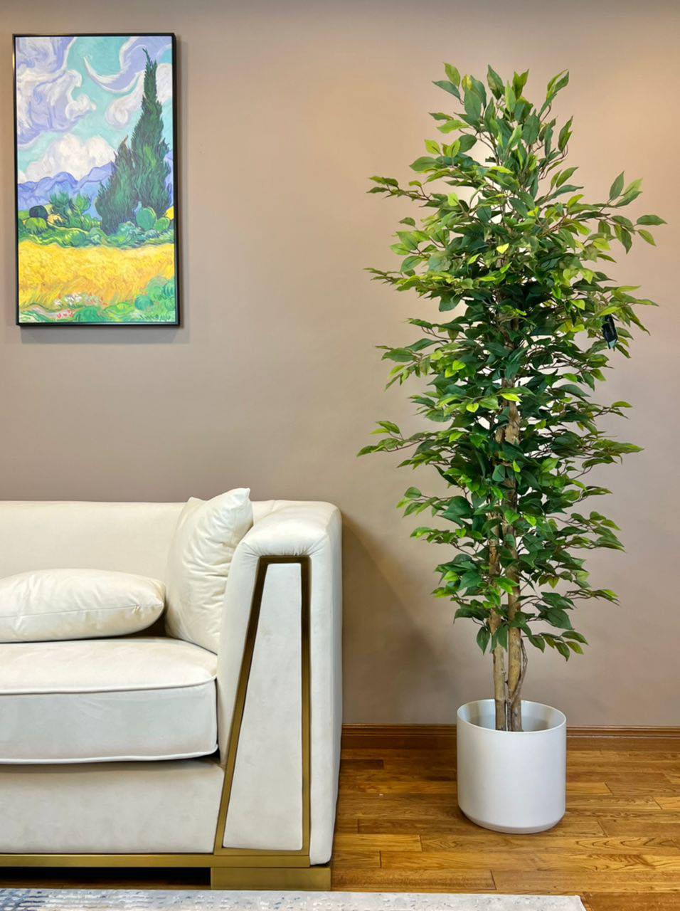 A 6 ft tall Artificial Ficus tree