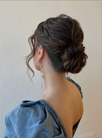 romantic updo with fanned out braid along the side