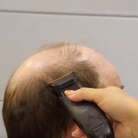 shaving man's hair using measurement