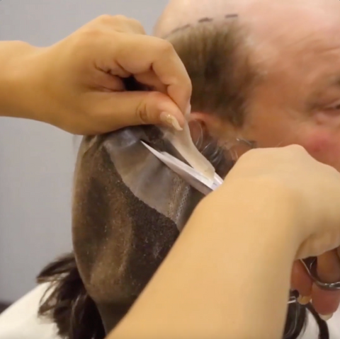 cutting extra skin base of hair replacement toupee