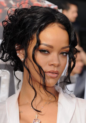 Rihanna with black curly updo