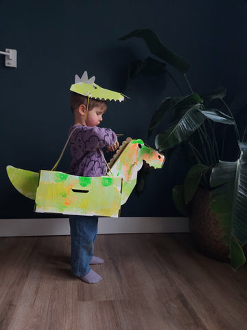 dinosaur costume and dress-up set decorated