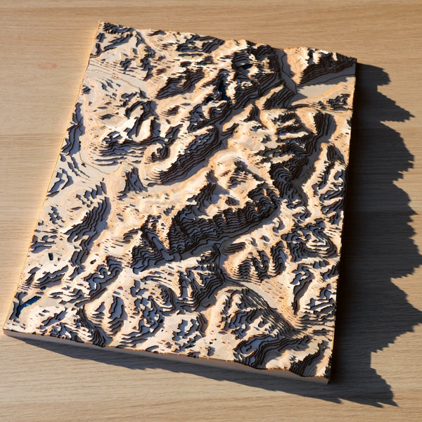 Relief of the Mont Blanc massif recreated in wood and lit by the setting sun