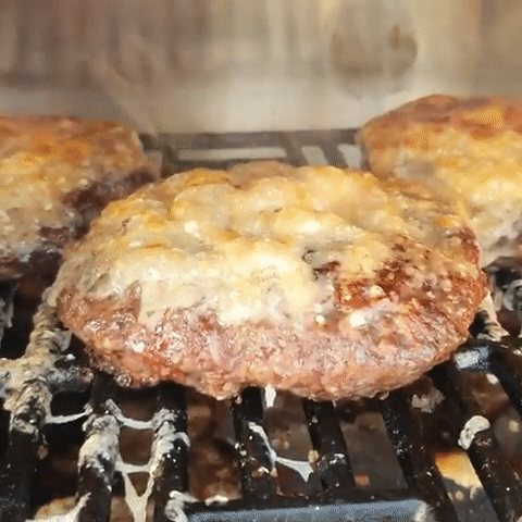 melting cheese on burgers