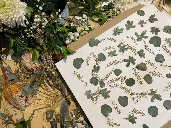 pressed wattle leaves & flowers from a bridal bouquet, created with joy art