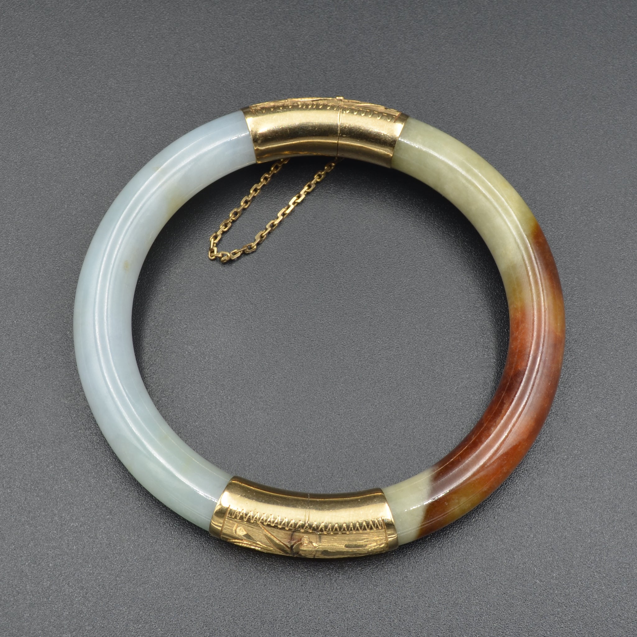 jade bangle with gold hinge