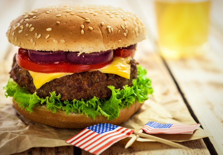 burger with two American flag picks in front