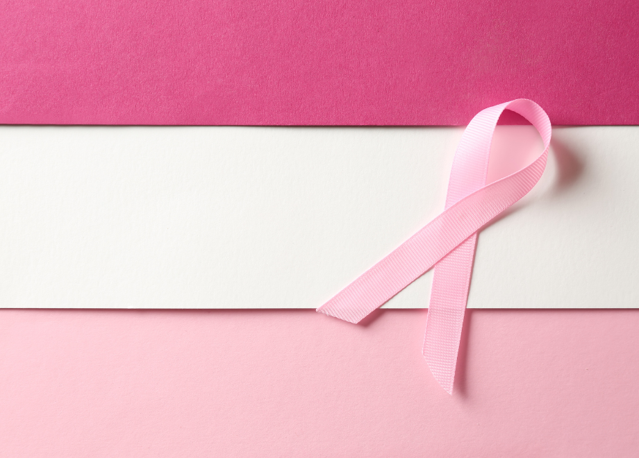 a pink breast cancer awareness ribbon on top of a pink and white background