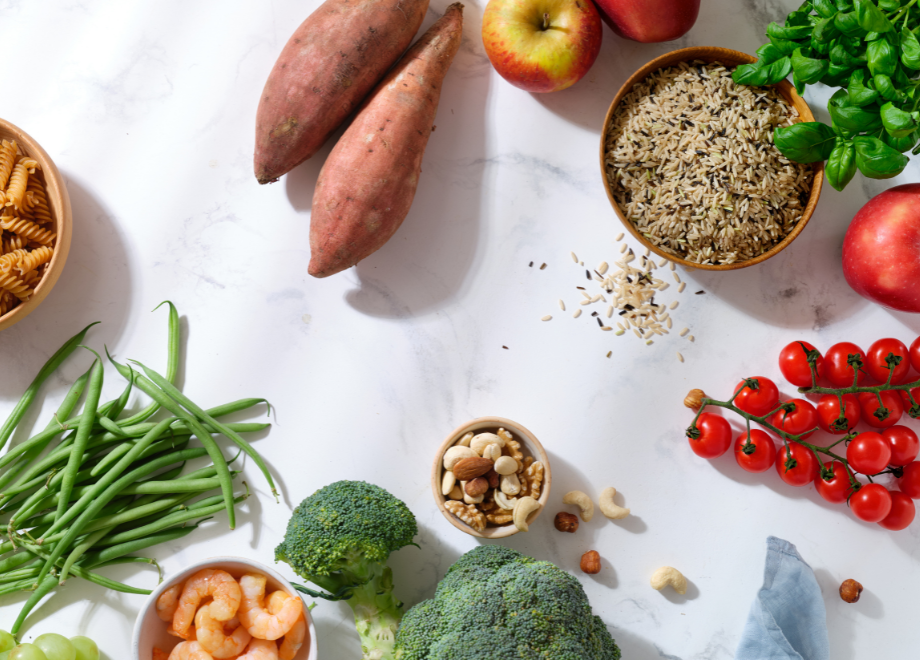 grey background with fresh vegetables