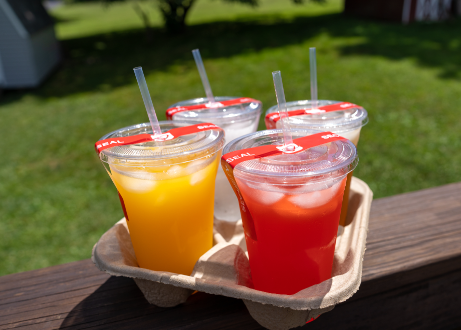 colorful drinks in a drink tray made from recycled cardboard