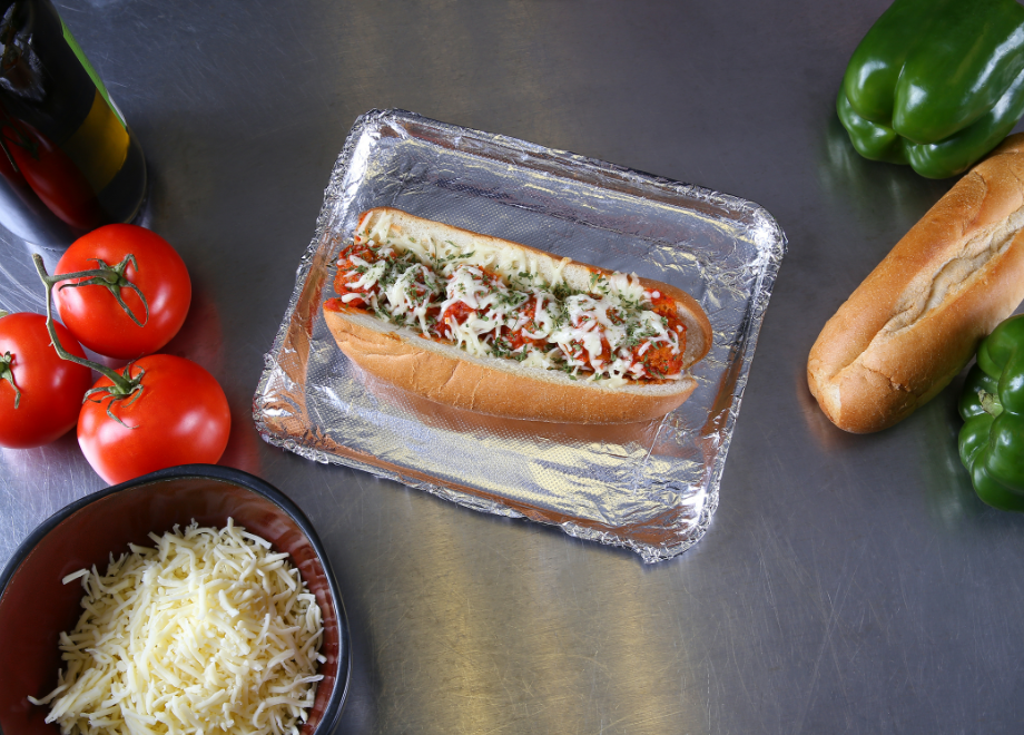 hot dog on a sheet of aluminum foil