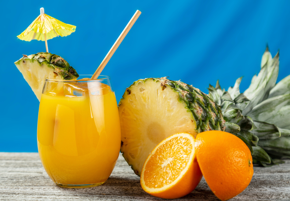 Fresh summer cocktail with pineapple and orange