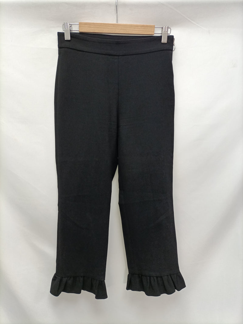 Pantalón negro volantes T.xs – Hibuy market