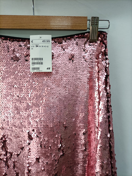 Sobrevivir cubrir lluvia H&M. Falda rosa lentejuelas T.34 – Hibuy market