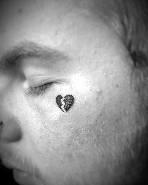 Broken Heart Face Tattoo