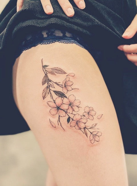 Got my first tattoo! Cherry blossoms for rebirth, renewal and good new  beginnings ✨ : r/WitchesVsPatriarchy