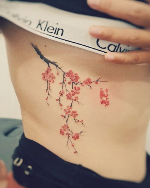 Cherry Blossom Rib Tattoo