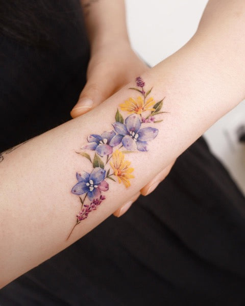 Daisy Watercolor Tattoo