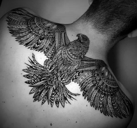 Flock of birds tattoo on the back - Bird Tattoos | Cage tattoos, Freedom  tattoos, Birdcage tattoo