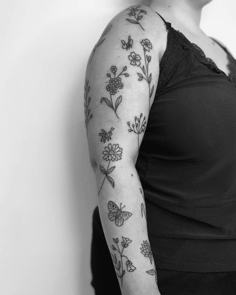 Female Patchwork Sleeve Tattoo