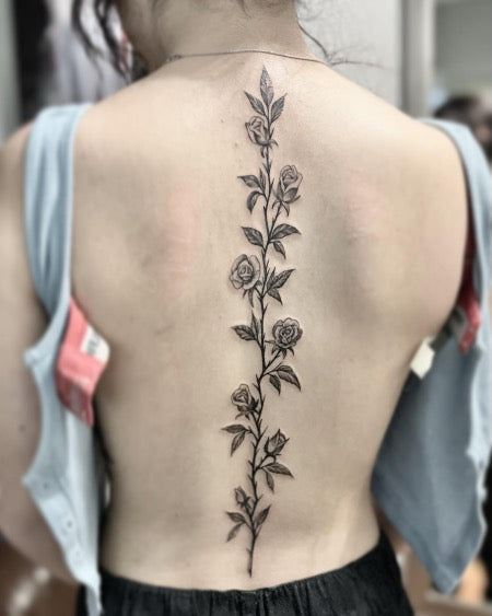 Roses and vines up spine tattoo  Vine tattoos Tattoos Rose vine tattoos