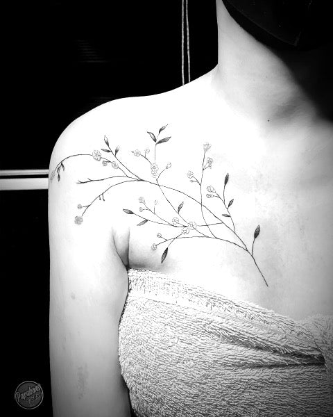 Elegant Black Flower Vine Tattoo