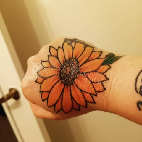 Hand Sunflower Tattoo