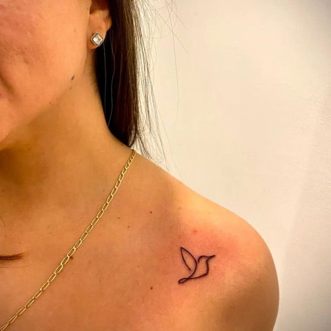 Hummingbird outline tattoo