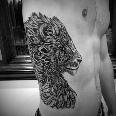 Lion Rib Tattoo