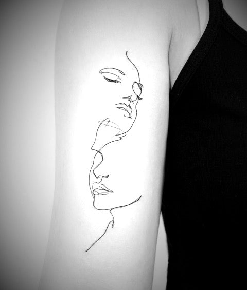 Minimalist Line Face Tattoo