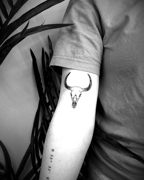 Minimalistic Bull Skull Tattoo