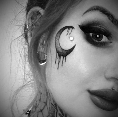 Moon Face Tattoo