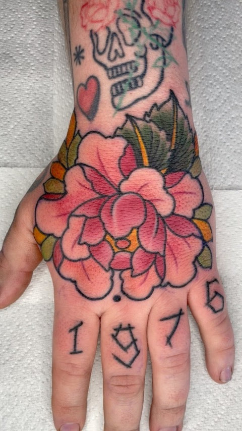 Peony Hand Tattoo