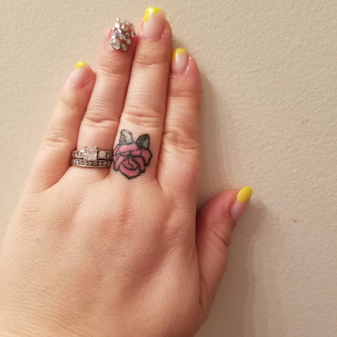Healed rose on the right ring finger. | Finger rose tattoo, Finger tattoo  for women, Ring finger tattoos